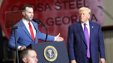 Clay Fuller speaks adjacent to Donald Trump