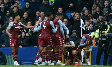 Aston Villa’s Lucas Digne and Matty Cash (right) react after being hit by an object in a Premier League match at Everton in January.
