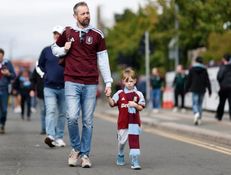 A couple of fans walk to Villa Park hoping to see their team score their first league goal of the season in four matches