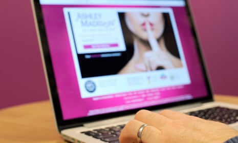 A man wearing a wedding ring looks at the Ashley Madison website.