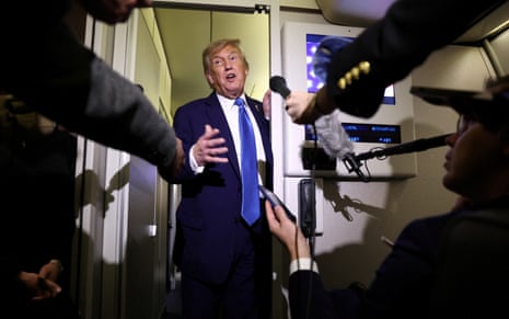 Earlier, Donald Trump was pictured speaking to reporters aboard Air Force One on his way back to Washington, after departing early from the the G7 summit in Canada to return to Washington.