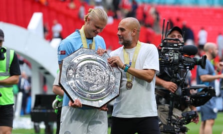 Pep Guardiola and Erling Haaland parade around Wembley after winning the Community Shield last week