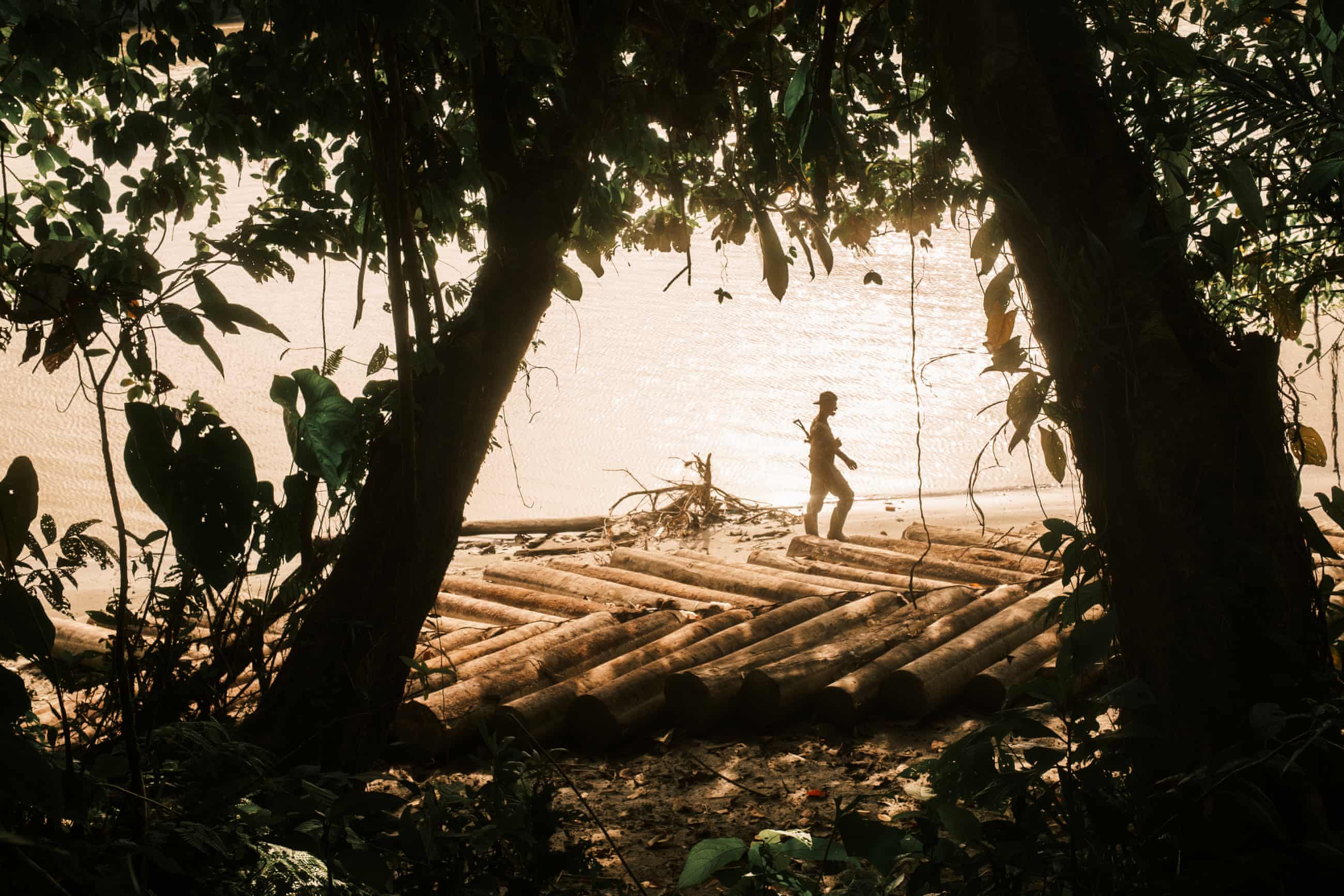 A fighter walks across a wooden raft