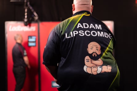 A picture of Adam Lipscombe's back with his name on his top