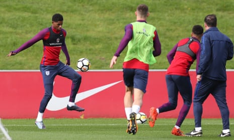 Marcus Rashford (left) is pictured in England training ahead of Thursday’s World Cup qualifer against Slovenia.