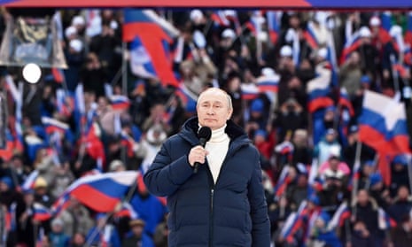Vladimir Putin gives a speech at the Luzhniki Stadium in Moscow
