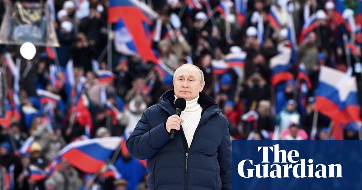 Putin praises Russian ‘unity’ at rally as glitch cuts state TV broadcast