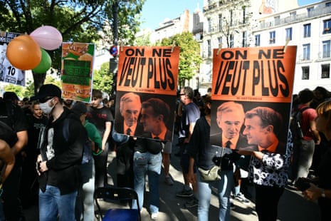 Placards, picturing France's president Emmanuel Macron (R) and French businessman and CEO of LVMH Bernard Arnault, reading ‘We do not want any more’ are displayed during a ‘block everything’ demonstration in Marseille, southern France.