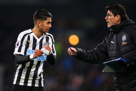 November 26: Ayoze Perez of Newcastle United is passed a note by Mikel Antia, assistant head coach, against Burnley at Turf Moor.