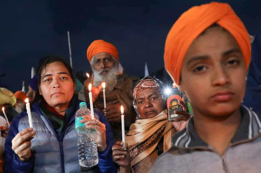 A candlelit vigil in memory of a person who died at the Singhu camp.