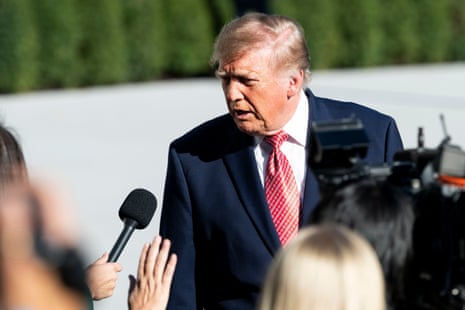 Trump speaks to reporters before leaving the White House for a campaign rally in Kansas. Photograph: Michael Brochstein/Zuma/Shutterstock