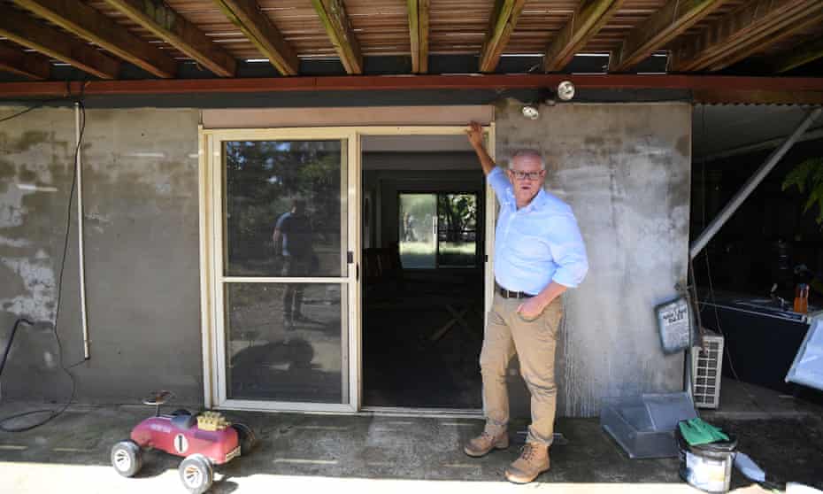 The prime minister, Scott Morrison, at a flood-damaged house in McGraths Hill in Sydney. 