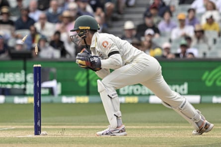 Alex Carey whips the bails off in Adelaide.