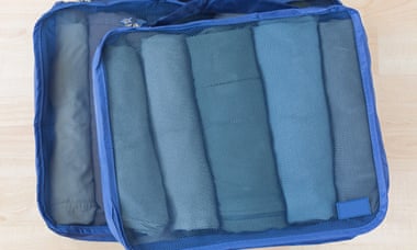 Packing cubes keep suitcases organised.