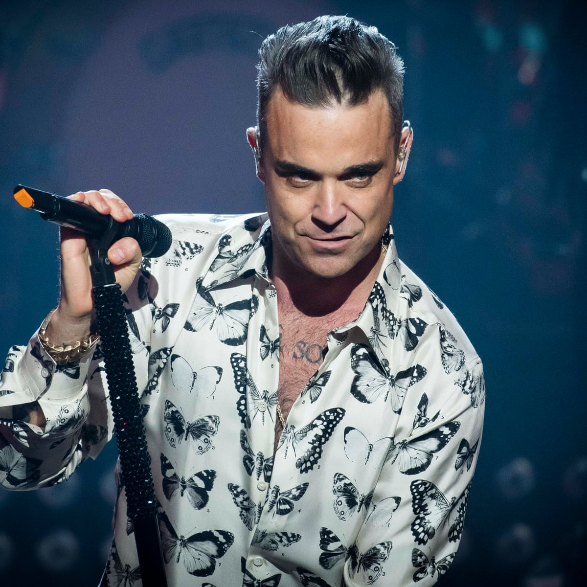 Robbie Williams Russian Video Shows Pop S Licensed Rogue Still Unpredictable Robbie Williams The Guardian Robbie Williams Russian Video Shows Pop S Licensed Rogue Still Unpredictable Robbie Williams The Guardian