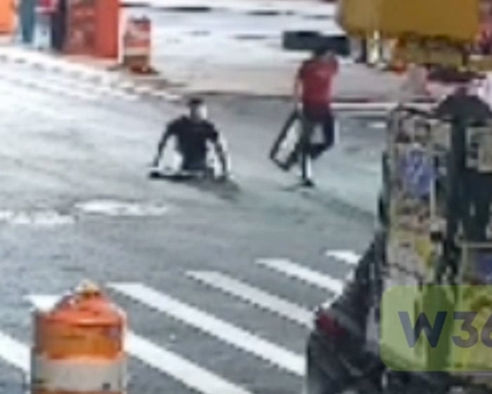 People emerge from New York City manhole – video