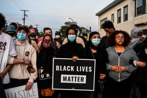 Protesters gather near the makeshift memorial in honor of George Floyd in Minneapolis, Minnesota, on 1 June.