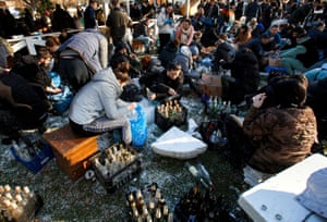 Local residents prepare Molotov cocktails to defend the city of Uzhhorod, Ukraine on February 27.
