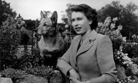 The Queen in Balmoral in 1952 with one of her corgis.