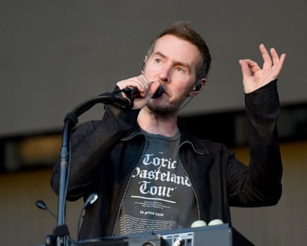 Robert Del Naja of Massive Attack performs on stage in 2016