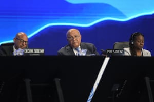 The Cop27 president, Sameh Shoukry (C), listening to speeches at the summit.
