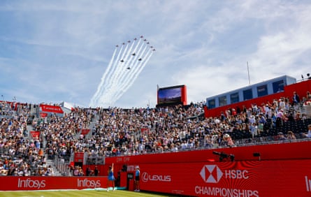 The Red Arrows go over Andy Murray Arena for the King’s Birthday flypast during Emma Raducanu’s quarter-final against Kamilla Rakhimova.