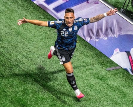 Lautaro Martínez spreads his arms in celebration after scoring his late winner for Argentina in the World Cup semi-final against England.