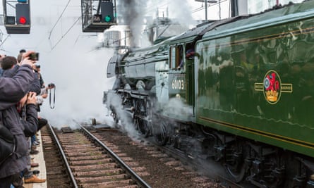 Flying Scotsman hauled a train full of VIPs on its first London-to-York run since the restoration was complete.