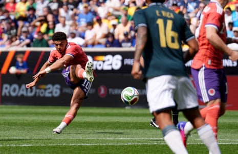 Scotland's Che Adams has a shot at goal.