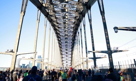Football fans were up early on Sunday to march across the Sydney Harbour Bridge.
