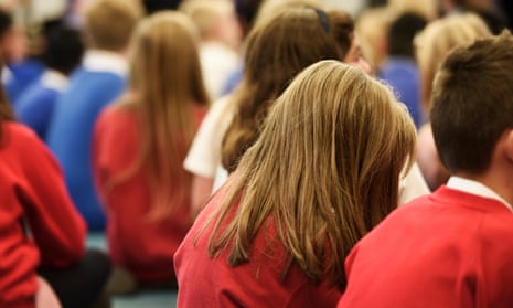 Children sitting in school assembly