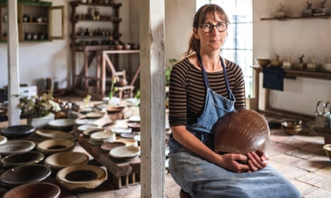 ‘Many a bean casserole has been baked in one of Anne Mette’s deep, soft-hued casserole dishes’: Danish potter Anne Mette Hjortshøj in her studio in Bornholm.
