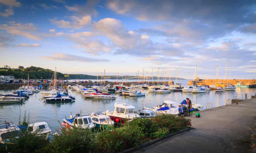 Boats on a sunny calm evening at Saundersfoot harbour.