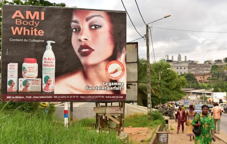 A hoarding advertising a skin-whitening cream in Abidjan, displaying prevailing ideas of beauty.