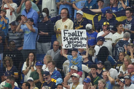 Milwaukee Brewers fans celebrate the club’s first World Series title after their Game 5 victory over the Tampa Bay Rays at Tropicana Field on Wednesday.