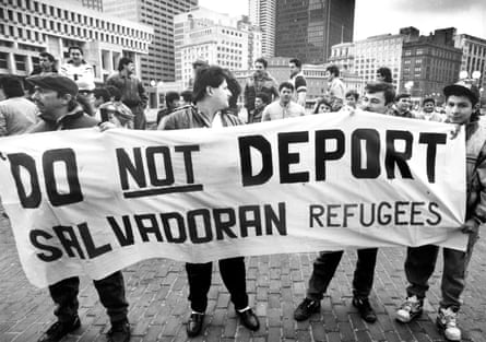 people hold a banner that reads ‘do not deport Salvadoran refugees’