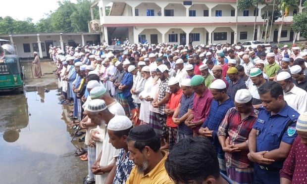 Mourners gather in Sylhet, Bangladesh, for the funeral of Rafiqul Islam, 51, and 16-year-old Mahiqul.