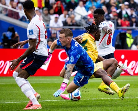Jordan Pickford clatters into Ghana’s Prince Kwabena Adu