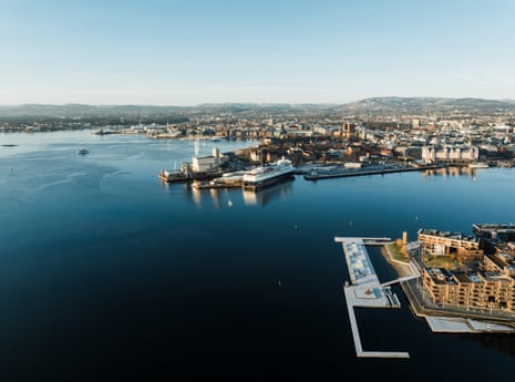 A harbour with tranquil water and buildings