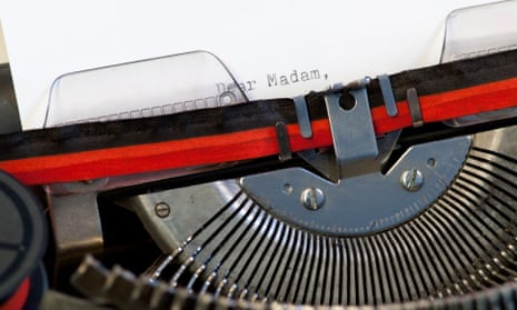 Type writer with "Dear Madam" written on it