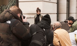 Doina greets photographers outside a London fashion week show.