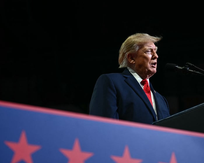 Trump targets Ilhan Omar at rally after raid on progressive congresswoman’s home – live