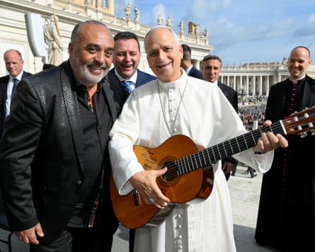 Pope Leo holding a guitar