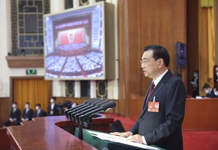 Outgoing premier Li Keqiang delivers a speech at the opening of the National People’s Congress.
