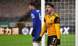 Pedro Neto celebrates after racing away to score a late winner for Wolves.