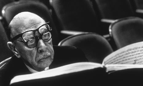 Composer Igor Stravinsky reading a musical score.