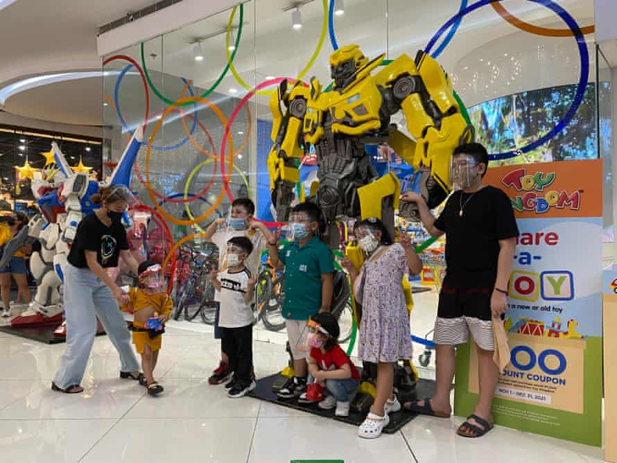 Joy, toys and bumper cars as Manila’s children reclaim the city | Global development 5 Juvy Matic’s grandchildren in a Manila mall