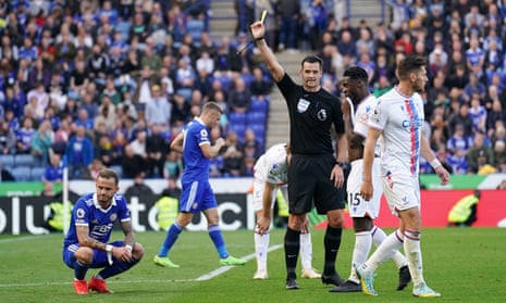 Leicester City's James Maddison is booked for a dive.