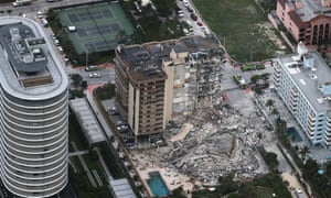 Search and rescue personnel work after the partial collapse of the 12-story Champlain Towers South condo building in Surfside, Florida.