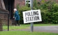 A voter at the polling station at Datchet Hall in Datchet, Berkshire.